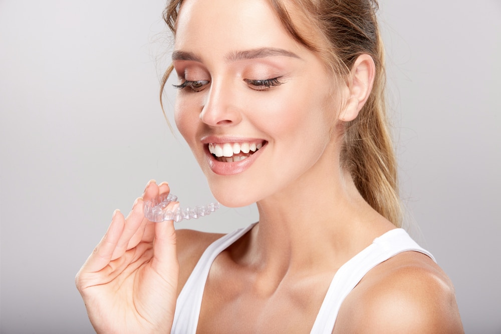 Invisalign for Teens: Weighing the Pros and Cons, invisalign clear aligners braces orthodontist orthodontics Dental Solutions of Mississippi Dr. Ruth Roach Morgan DDS Dr. Jessica Morgan Vaughn DMD provide Family, Cosmetic, Restorative Dental Care & Invisalign braces in Canton, MS. Teeth whitening, cleaning, veneers, same day crowns, implants, braces, bonding, wisdom tooth extraction, emergency dentist, cosmetic dentist, restorative dentistry, dental bridge bridges laser dentistry in canton, mississippi